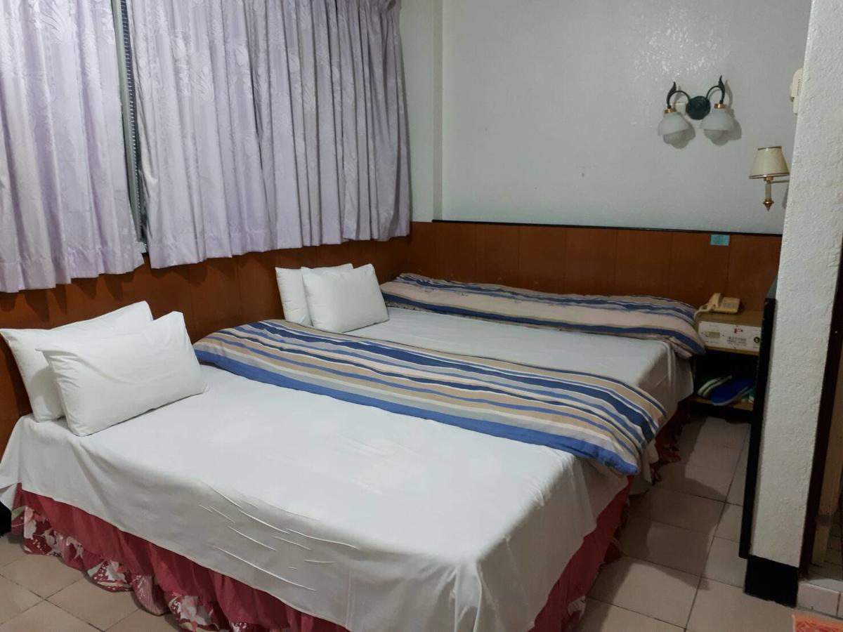 Zhen Wang Zi Hotel Chenggong Bagian luar foto